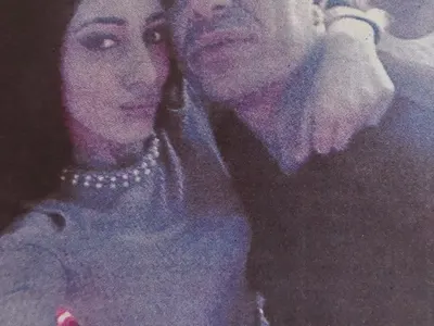 Коцето пак кръшка на жена си, плеймейтка го издаде със снимка