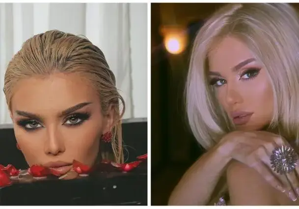 Лидия със сърце върху колата си