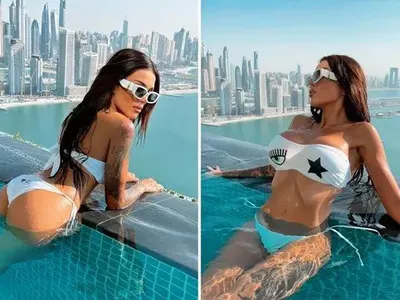 Диона се плацика в басейн на покрива