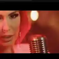 Анелия сложи червена перука